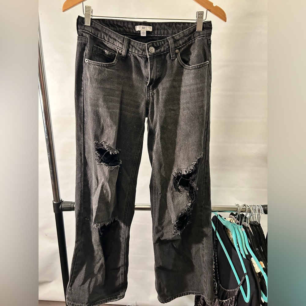 Black jeans with holes